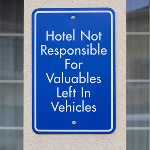 Hotel not responsible for valuables left in vehicles sign 