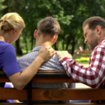 parents consoling son